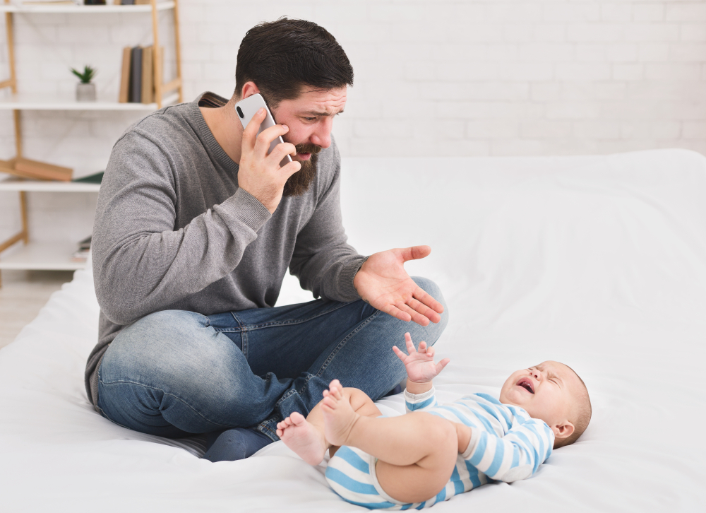 father calls for help crying infant