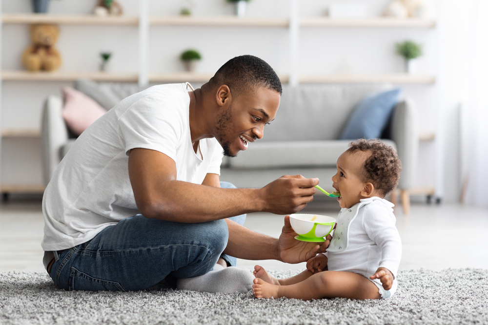 Father's,Care.,Loving,Black,Dad,Feeding,His,Cute,Baby,Son