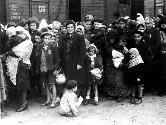 German Nazi death camp Auschwitz in Poland, arrival of Hungarian Jews, Summer 1944. The image is part of the Auschwitz Album (see here and here, Yad Vashem.) See also http://www.zug-der-erinnerung.eu/Bilder/ausalb113.jpg