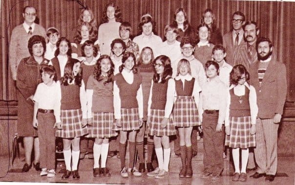 7th grade. Merle, front row, second from left, giggling as usual. I'm two rows behind her, also second from left. I made a face at exactly the moment the photographer snapped the picture.