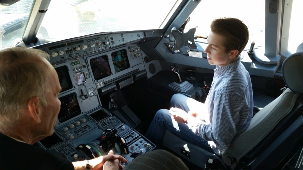 Kerri says, "Tommy got to sit in the cockpit with the pilot after our flight to DC. He impressed them (& me) with all of his knowledge of everything in there."