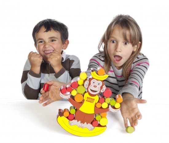 Kids playing KeeKee the Rocking Monkey. (photo courtesy: Blue Orange Games), board games