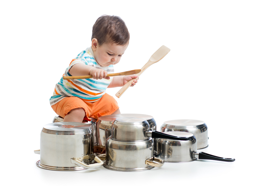 toddler bangs on pots