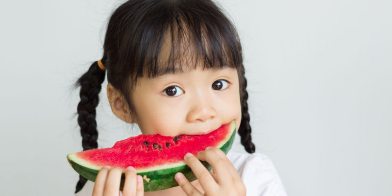 asian-child-eat-watermelon