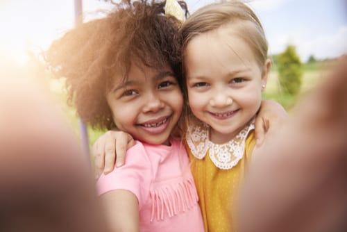 Little girl best friends take a selfie