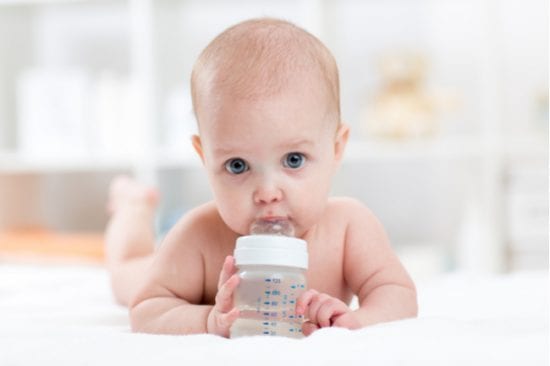 Baby with water bottle