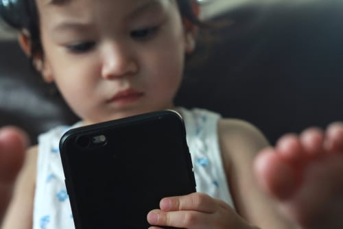 Preschooler with smartphone