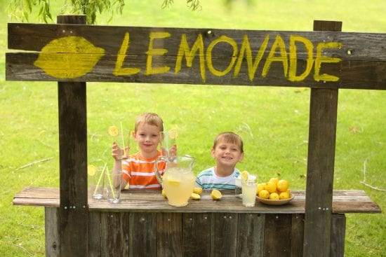 Lemonade stand manned by two boys, the classic child-owned business