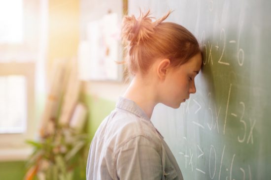 Girl Struggles with Math Dyscalculia 