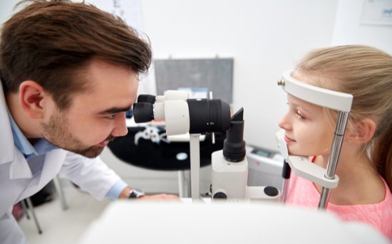 Child having eye exam