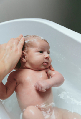 Baby gets a shampoo