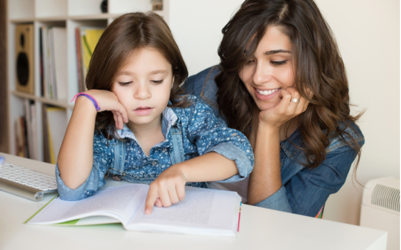 schooling mother and daughter white