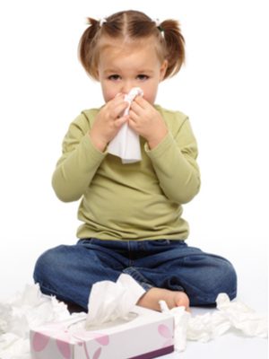 little girl blows nose using endless tissues