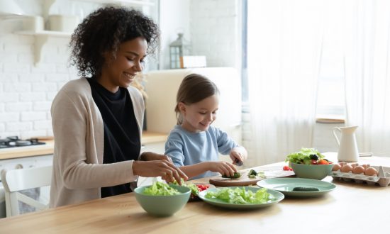 biracial mom and caucasian daughter make a summer no-cook salad together