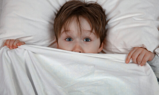 Frightened child having coronavirus nightmare