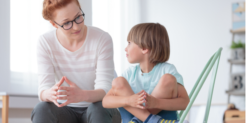 mom and small boy have a chat