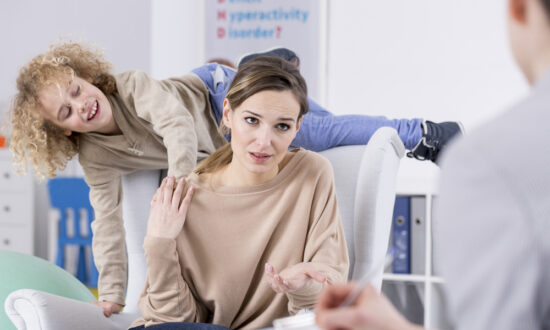 excitable child with tired mother sees therapist during pandemic