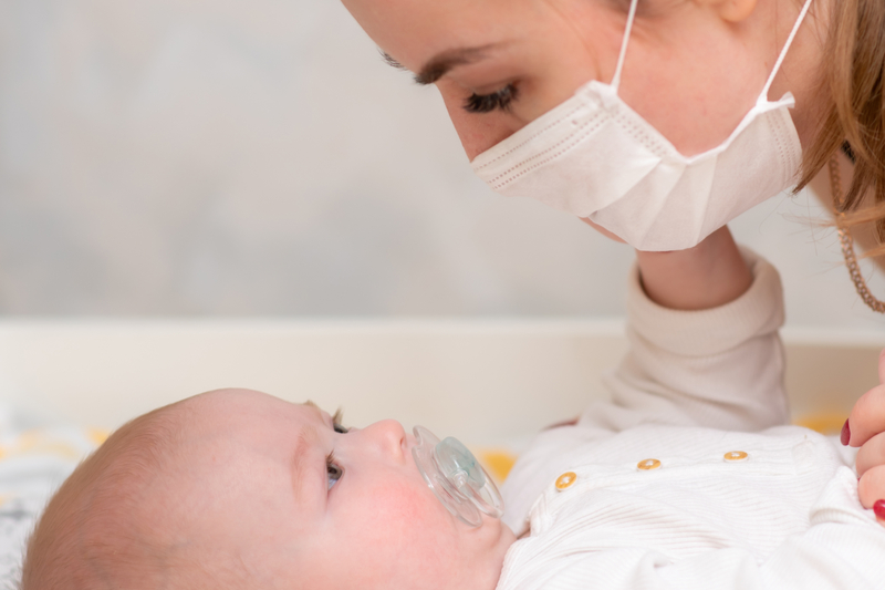 protective masks mean baby cannot read lips