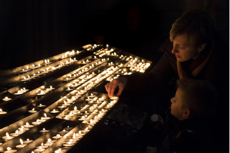 helping children deal with loss from covid19 by lighting candles for loved ones