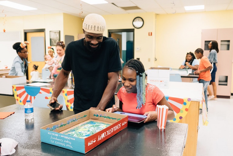 Duquesne City School District hosts an “Innovation Carnival” for students to teach their parents about the tech tools they use in class for Remake Learning Across America (Photo Credit: Ben Filio)