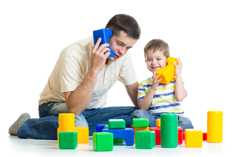 boy role plays telephone call with dad language disorders