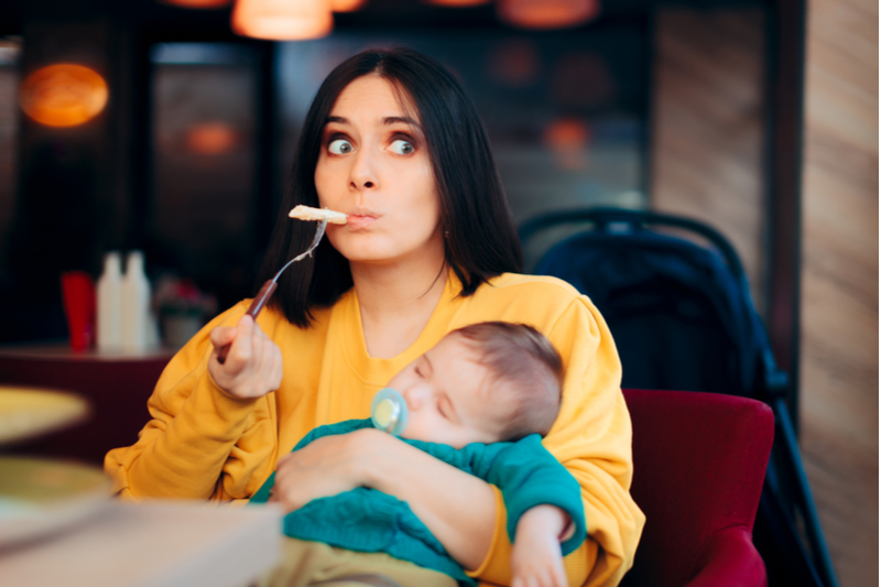 mom caught eating in restaurant as newborn sleeps