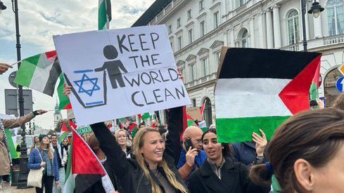 Campus protest sign, anti-litter sign with stick figure throwing away blue jewish star: Keep the world Clean