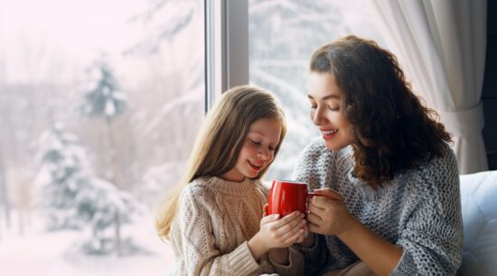 mom and daughter share mug, Mom approves of kids drinking coffee